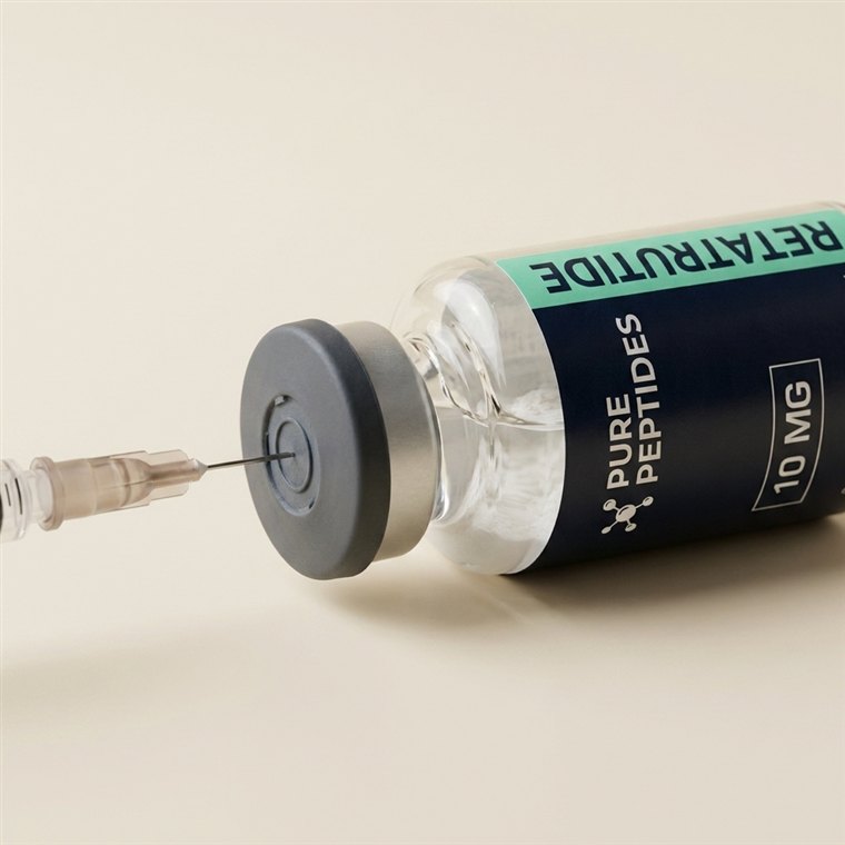 Needle angled so water runs down the inside wall of the vial